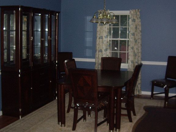 Formal Dinning Room with Cathedral Ceilings