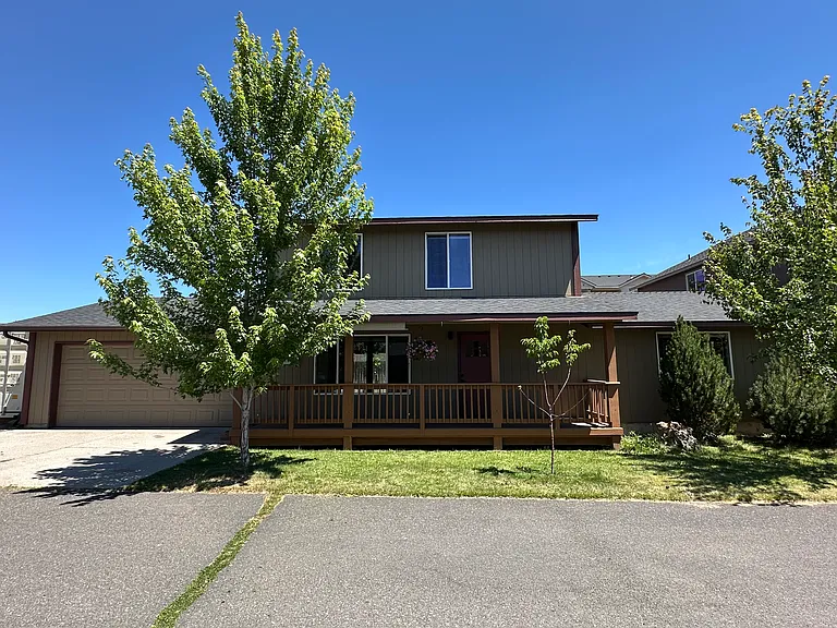 Front view from neighborhood private drive.