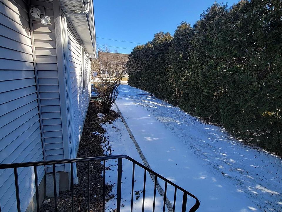 Walkway and entrance to apartment from parking spot.