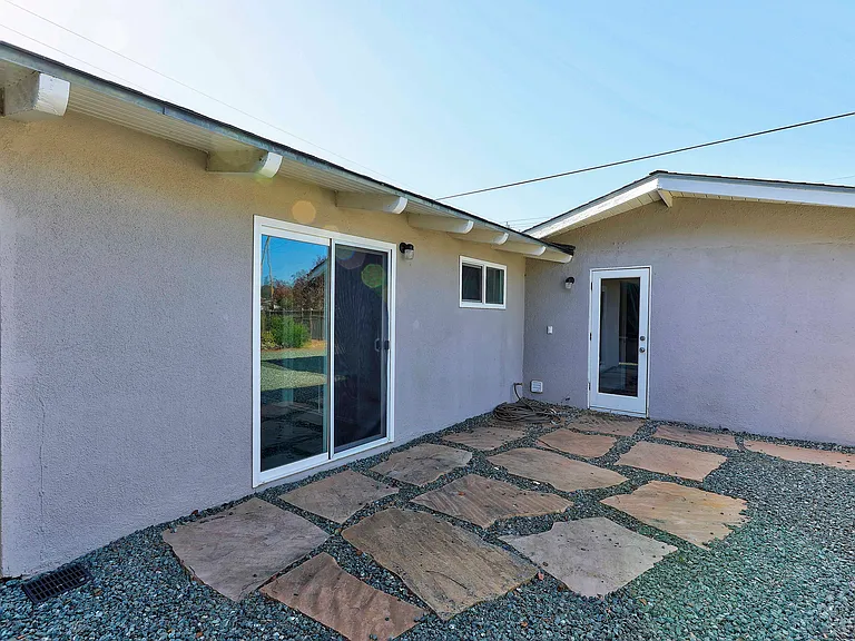 Backyard patio off bedroom