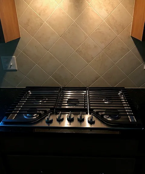 Natural Gas Cooktop with Tile Backsplash