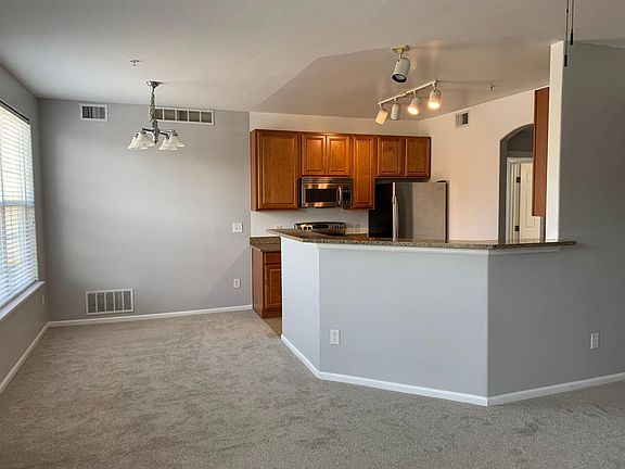 Kitchen and dining area from living room