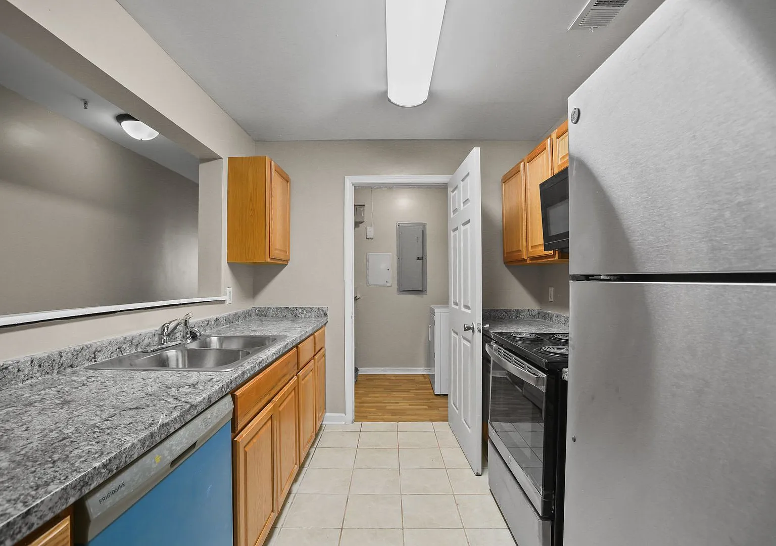 Spacious Three-Bedroom Condo with In-Unit Laundry — Photo 3