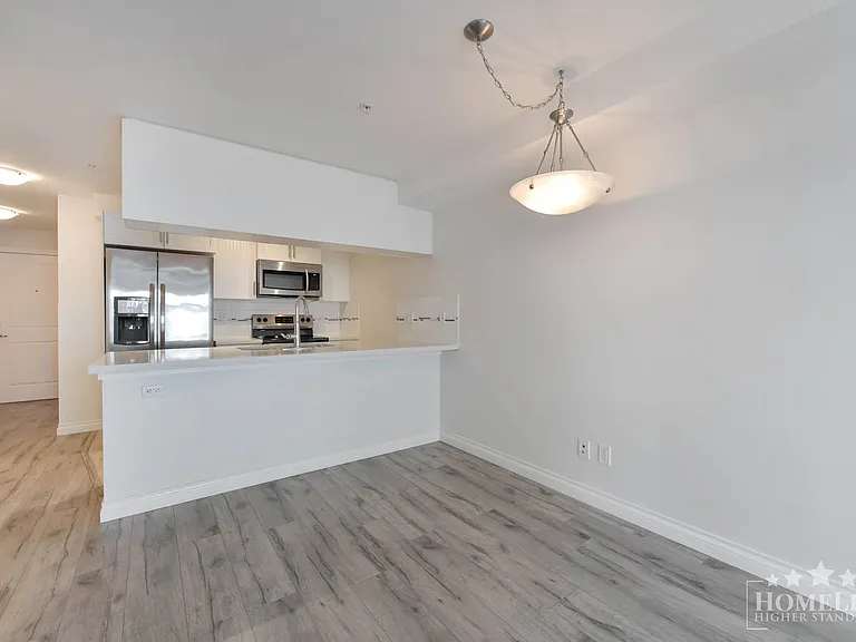 5650 201a St #218 — Photo 6