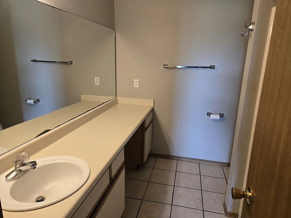 Master bathroom with tub/shower, located in master bedroom