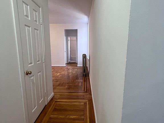 Halway view towards living room and bedroom