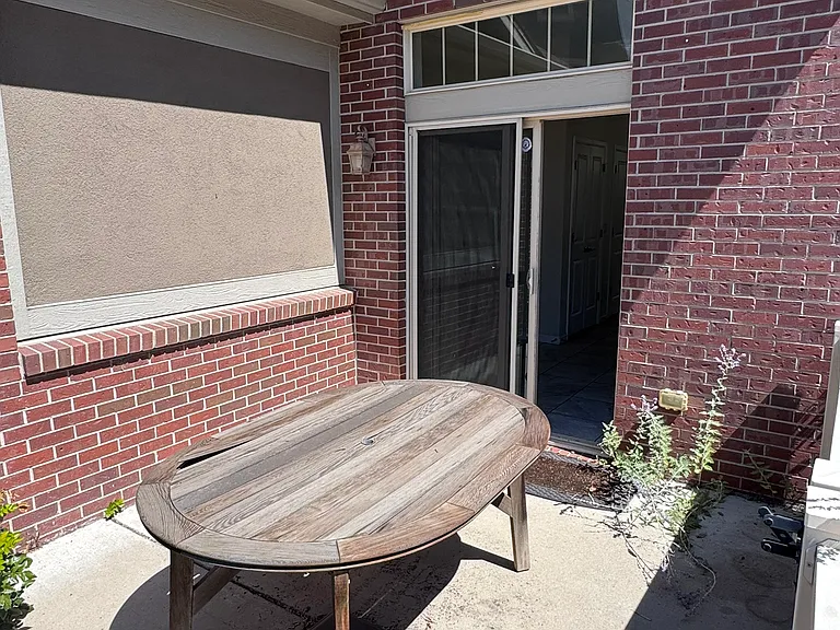 Sunny southwestern facing patio, this is off of the kitchen