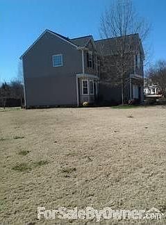 Side view
						:
						Corner lot offers more privacy