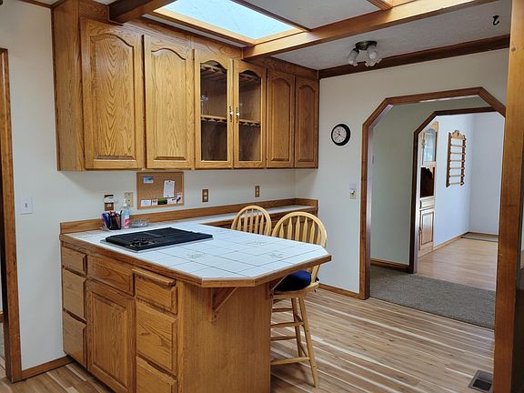 Kitchen with plenty of cabinets and Jen Air grill