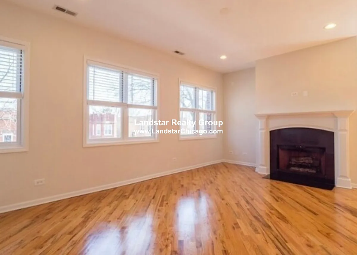 Building Photo - 7228 N Bell Ave #3S