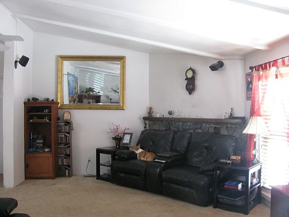 fireplace behind couch