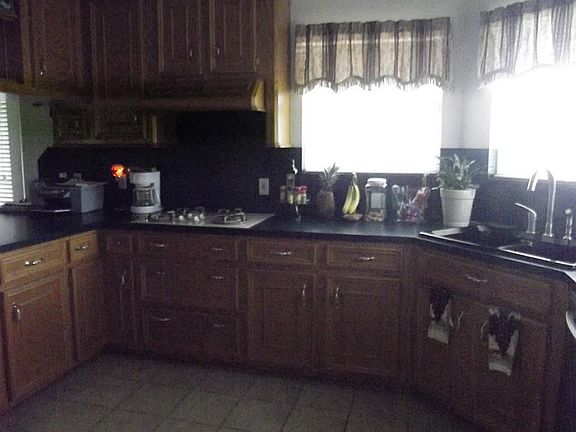 Large kitchen. Love the windows.