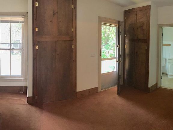 Dining room, back entrance, and bathroom