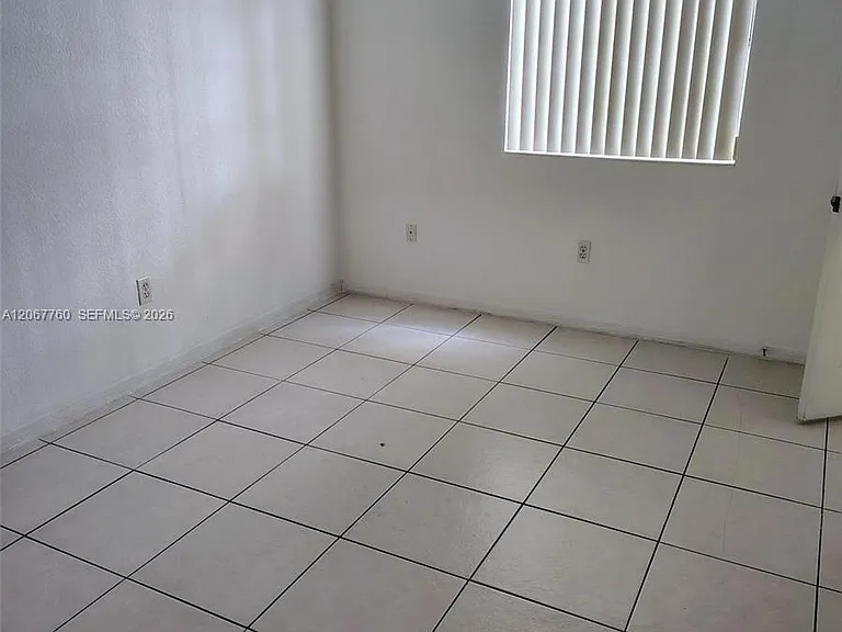 6990 NW 179th St #101-2 — Photo 6