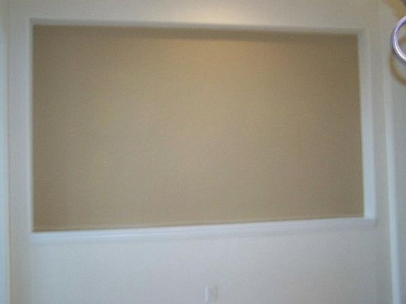 This " Niche   for your art work w/  another small one is on wall in this foyer..