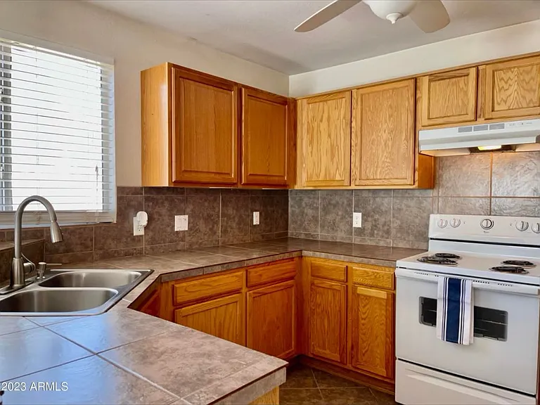 12713 W Paradise Dr — Photo 2