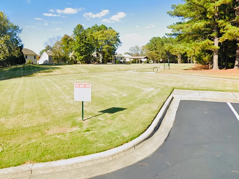 Entrance to second park diagonal from your door, allows for extra guest parking and entertaining or a nice stroll.