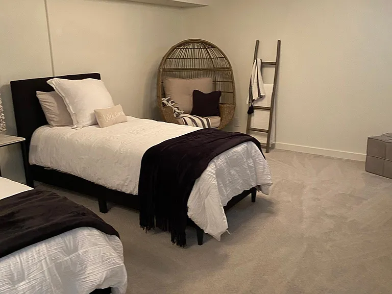 Beautiful remodeled basement with new carpet.