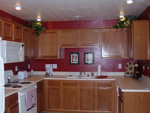 LARGE OPEN KITCHEN WITH LOTS OF CABINETS