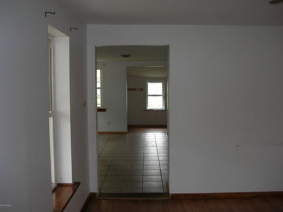 LIVING ROOM INTO KITCHEN TILE FLOOR