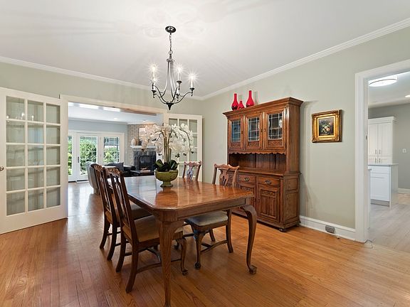 Elegant and Expansive Dining Room with French Doors