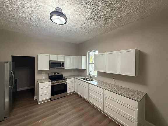 Kitchen new granite counters, new cabinets and new appliances