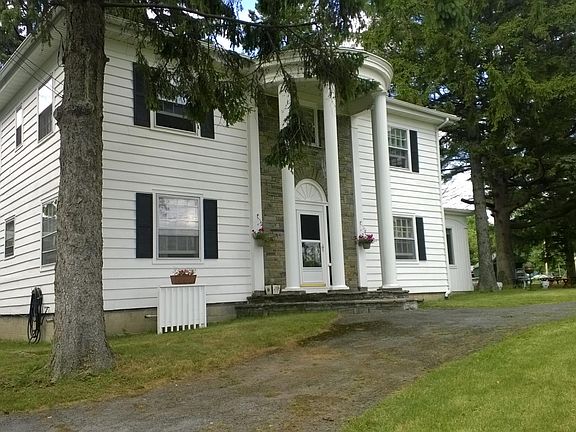 Front and side view of house