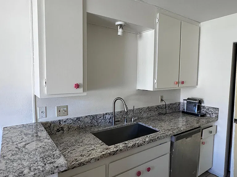 Kitchen with granite top spacious sink