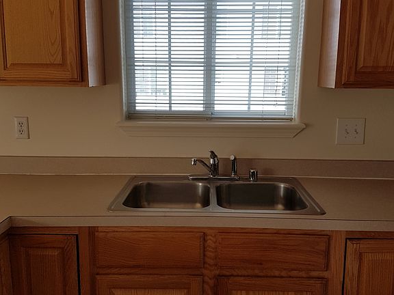 Sunny window over the kitchen sink makes doing dishes a litt