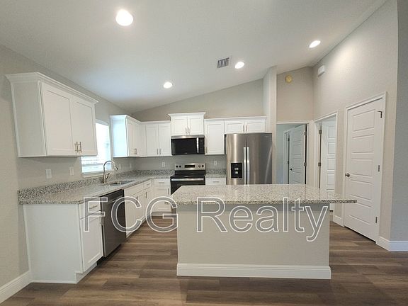3rd image of 9379 N Sandree Dr