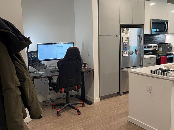 Immediately inside the unit looking toward den nook