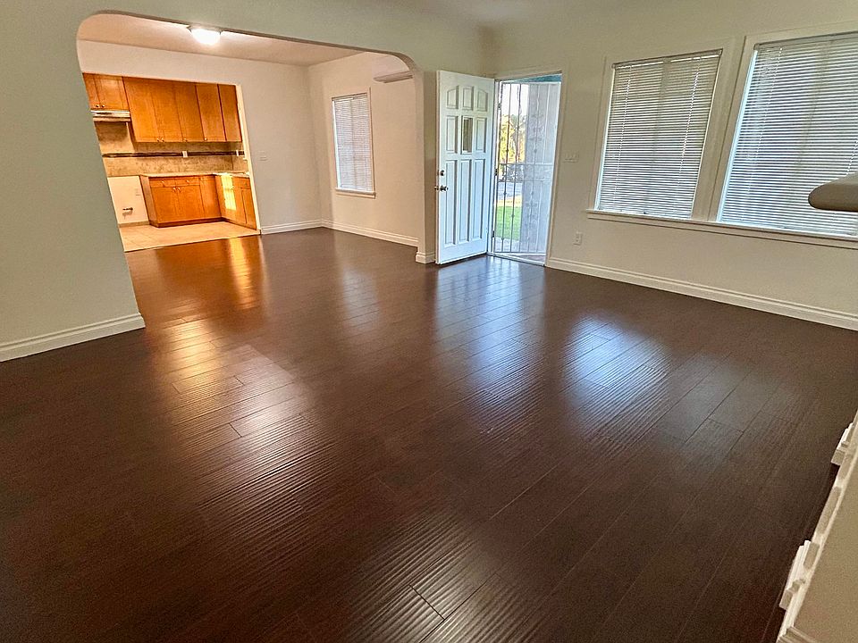 Open floorplan from kitchen, through dinning room, & living room