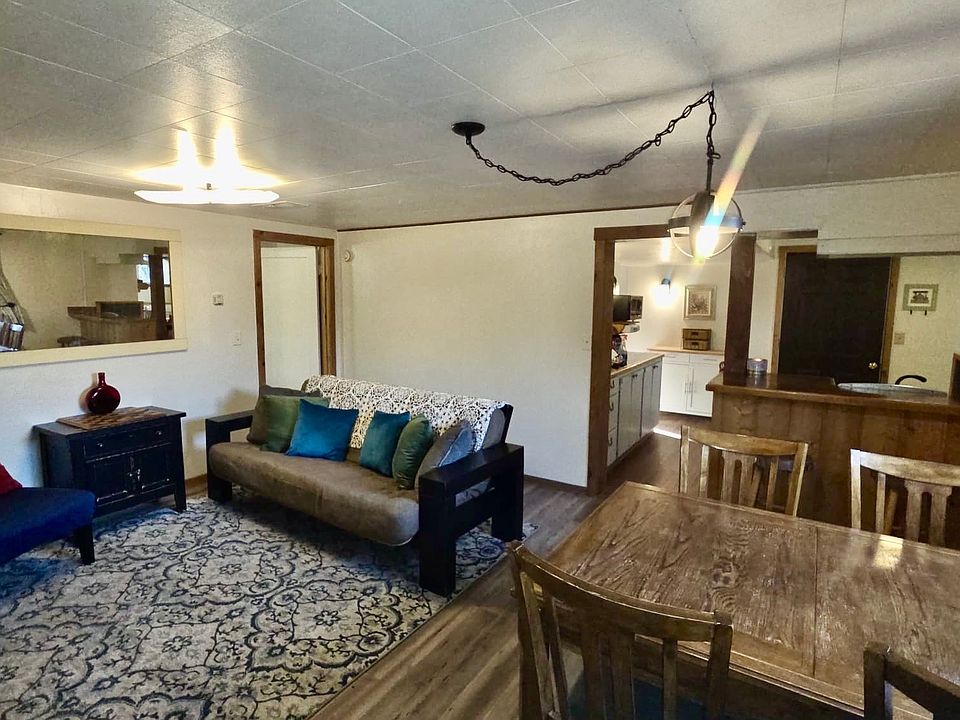 Living room, dining table, looking into kitchen
