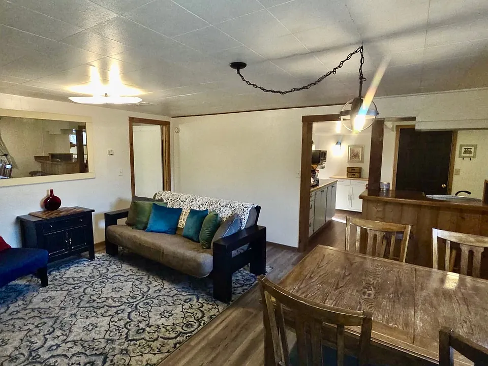 Living room, dining table, looking into kitchen