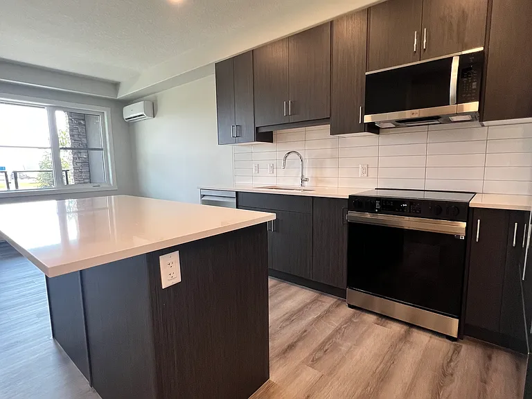 125 Wolf Hollow Cres SE — Photo 6