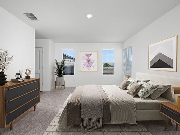 The master bedroom is the perfect place to relax at the end of the day.