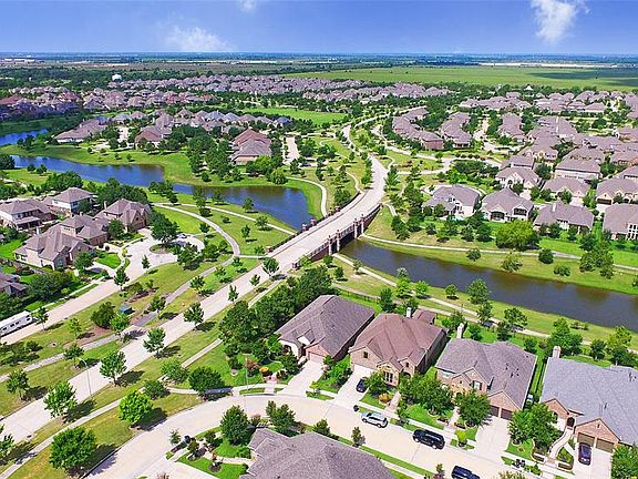 Beautiful aerial view of the home and lake