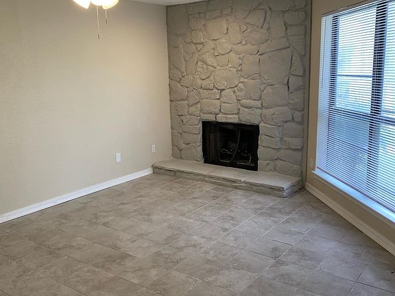 Wood burning fireplace awaits you in the family room