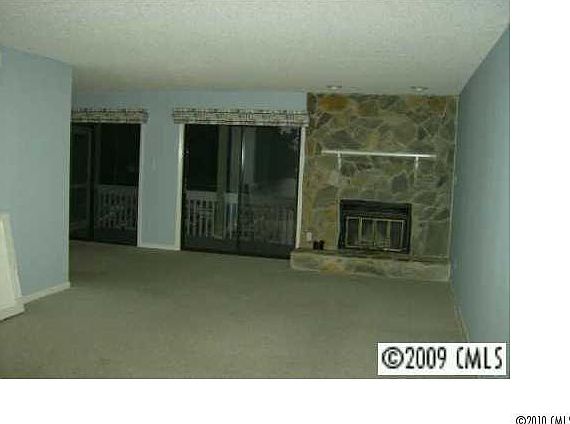 The woodburning rock fireplace.