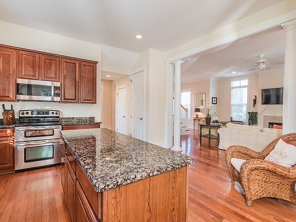 Kitchen opens to family rm