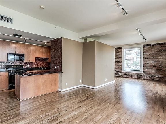 Same photo as previous without virtual staging, allowing you to see the beautiful architectural details. Can you imagine all of your personal belongings in this space, creating your home?