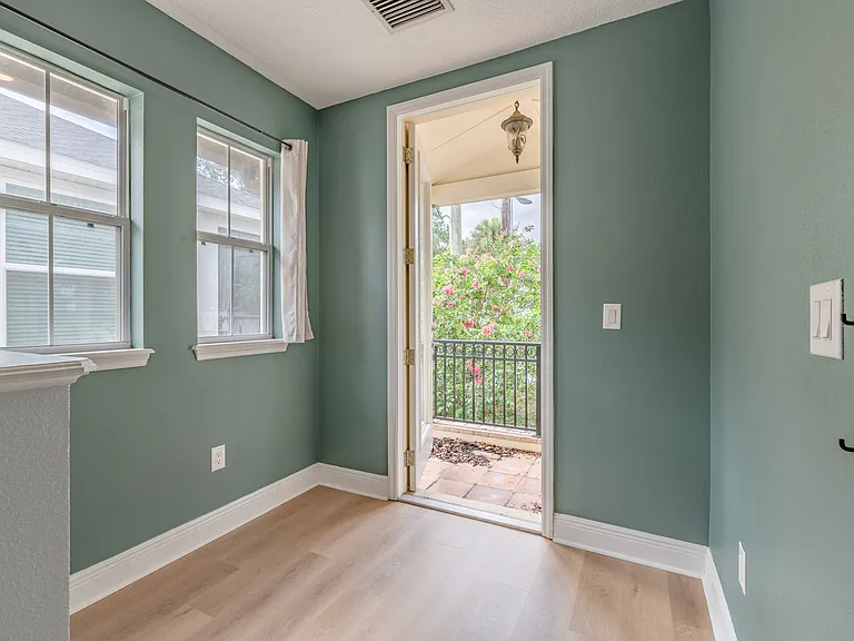 This is the door that leads to the second-level balcony.