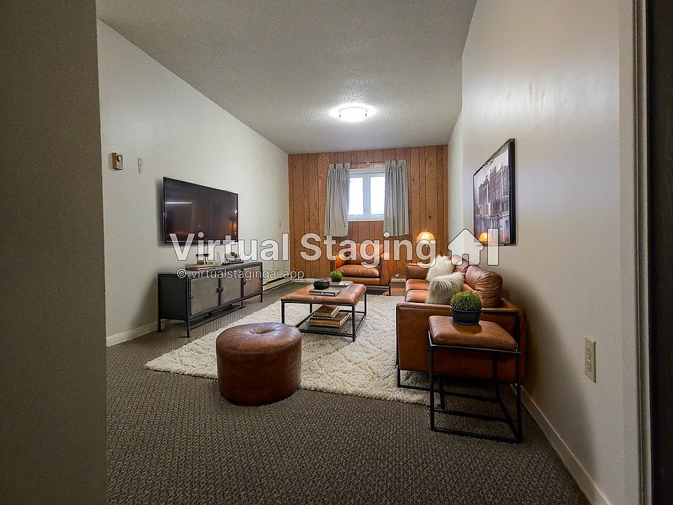 Livingroom is approx. 11ft 4in wide with warm wood paneled accent wall.

photo was virtually staged for layout inspiration