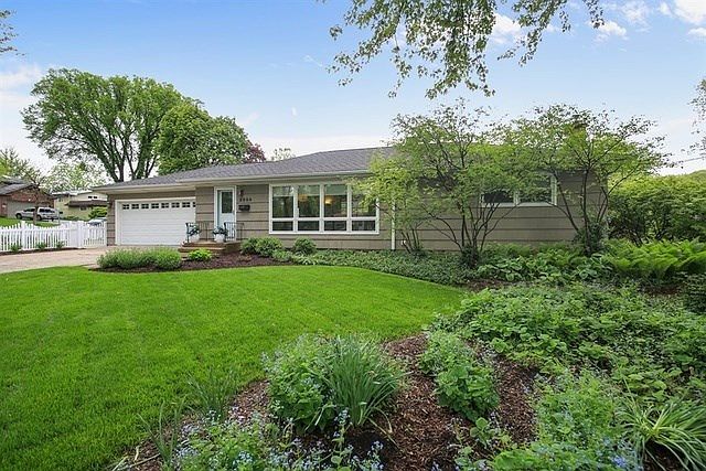 2050 Prairie, Downers Grove is a picture perfect home! Professionally landscaped with private side y
