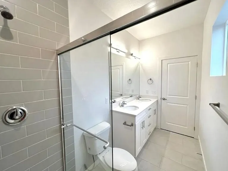 Bathroom #4: Full bathroom with double vanity from master suite (shower, sink, and toilet)