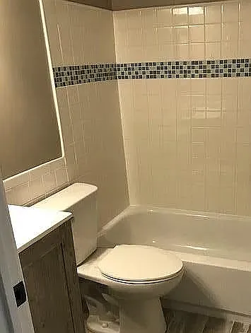 Elevate your living standards at LS Capital Group. This stylish bathroom features modern finishes and a soothing atmosphere, perfect for relaxation. Don't miss out on your chance to call this place homeschedule a tour today!