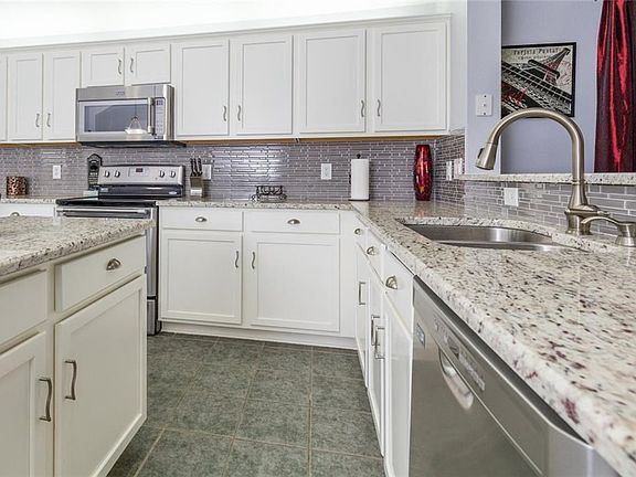 Granite, island, glass tile backsplash
