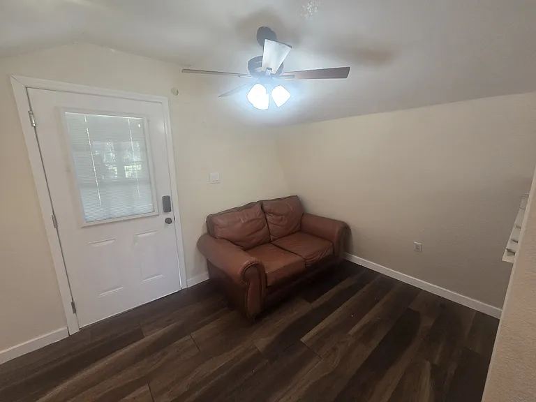 this is the living room area.. you are welcomed to use this loveseat