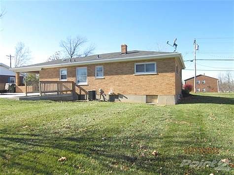 Rear view of dwelling.  Clean lines.  Walk up from basement.