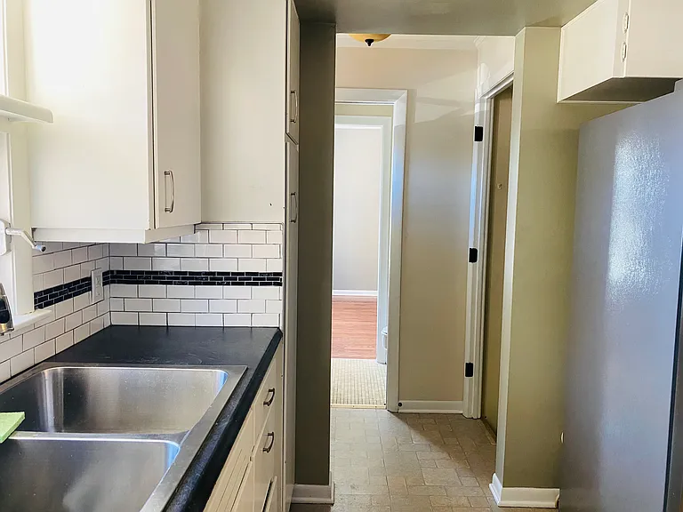 8837 Manor Ave — Photo 12